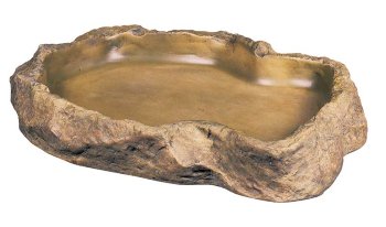 Кормушка-камень пластик для террариума экстра-большая Exo Terra Поилка-камень пластик для террариума, натуральный внешний вид позволяет использовать в террариуме любого типа.